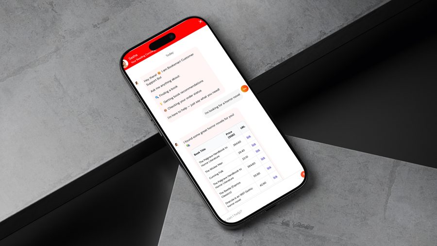 The Sasha chat open on a phone. Sasha greets the reader and offers help finding a book, recommendations or order status. The reader asks for a horror novel, and Sasha answers with a table of titles, prices in SGD and links.