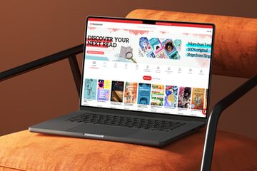 The Booksmart storefront open on a laptop, showing the Discover Your Next Read banner above rows of bestsellers.